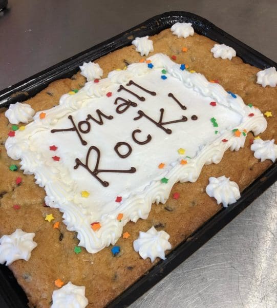 Cookie Cake with buttercream frosting and the words You all Rock!