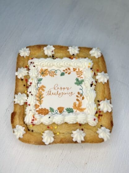 cookie cake that says happy thanksgiving