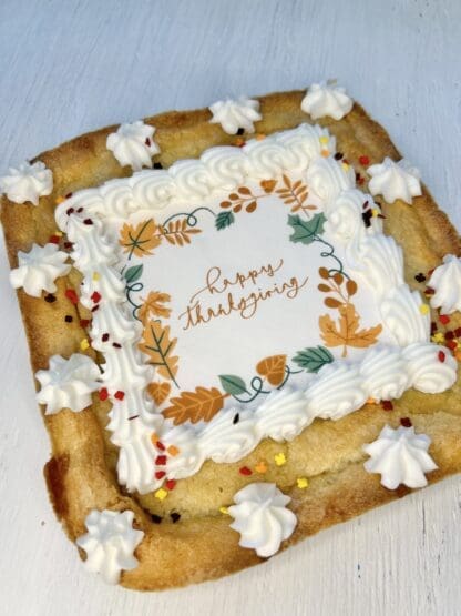 Sugar cookie cake with Happy thanksgiving and fall leaves